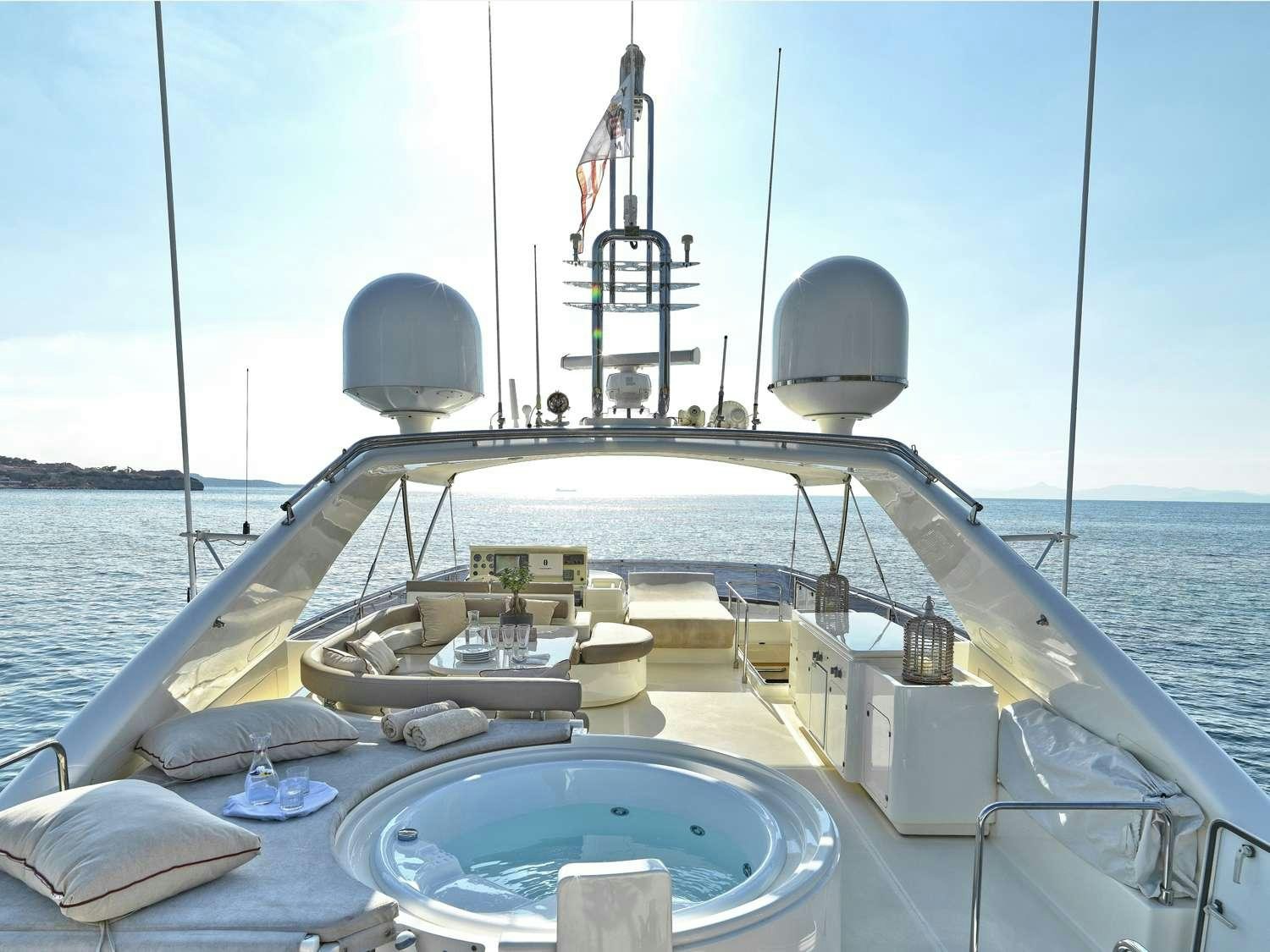 a boat with a large antenna aboard JULIE M Yacht for Charter