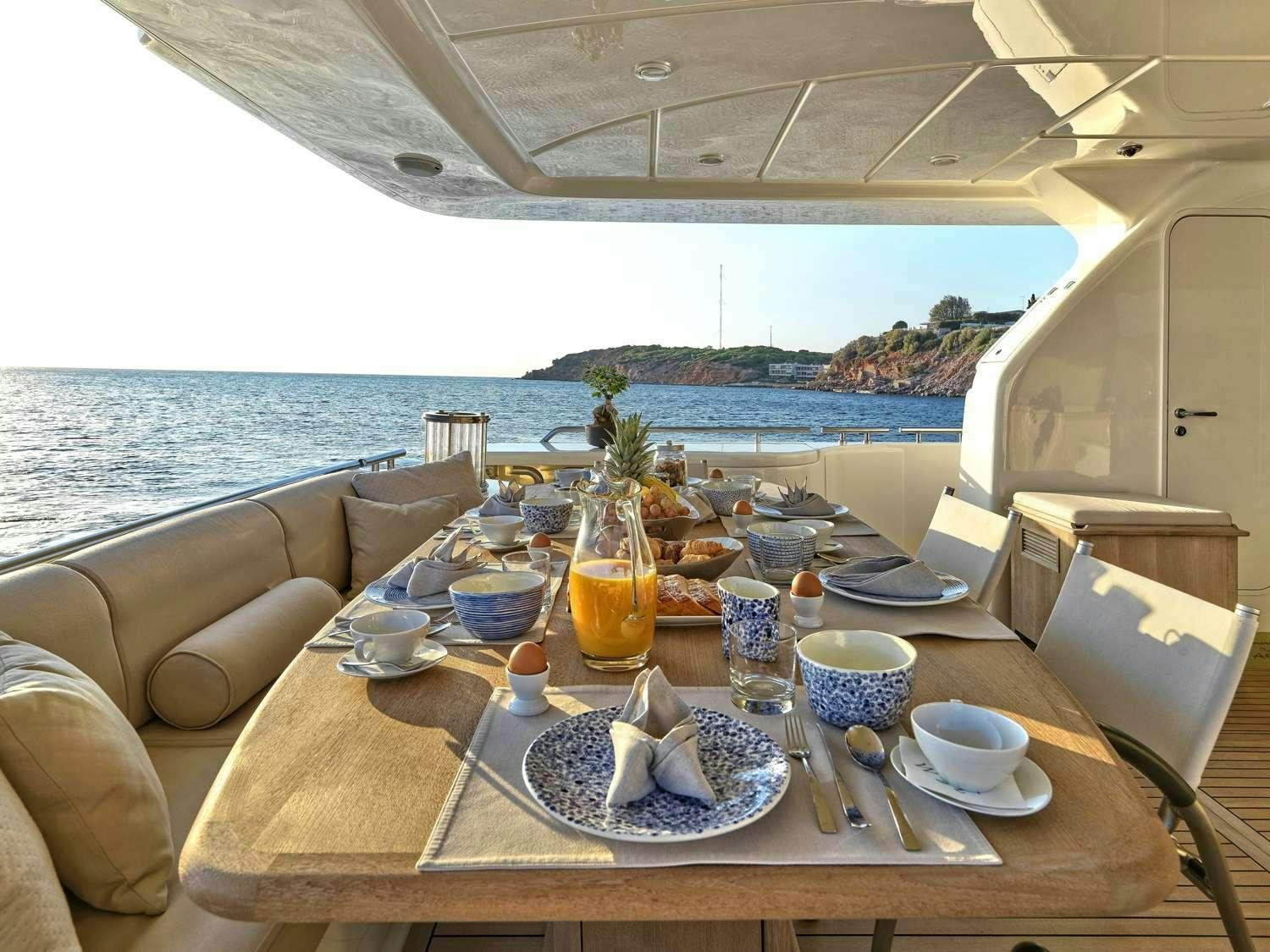 a table with food on it aboard JULIE M Yacht for Charter