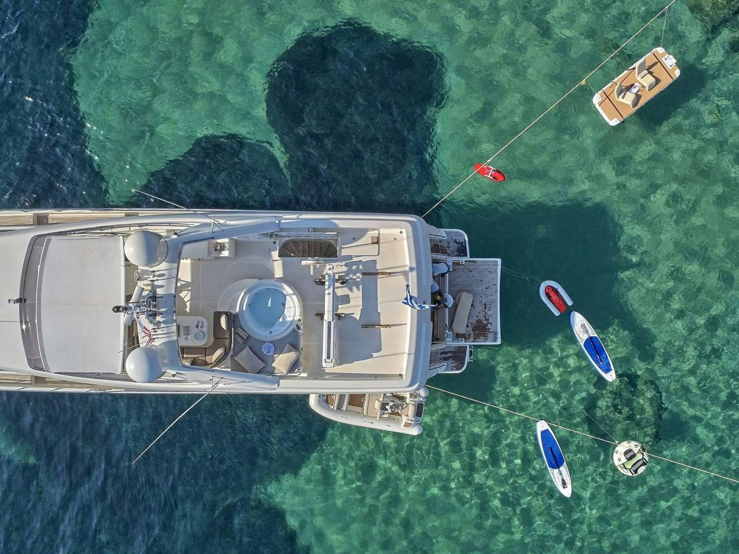 a satellite in the air over a body of water aboard JULIE M Yacht for Charter