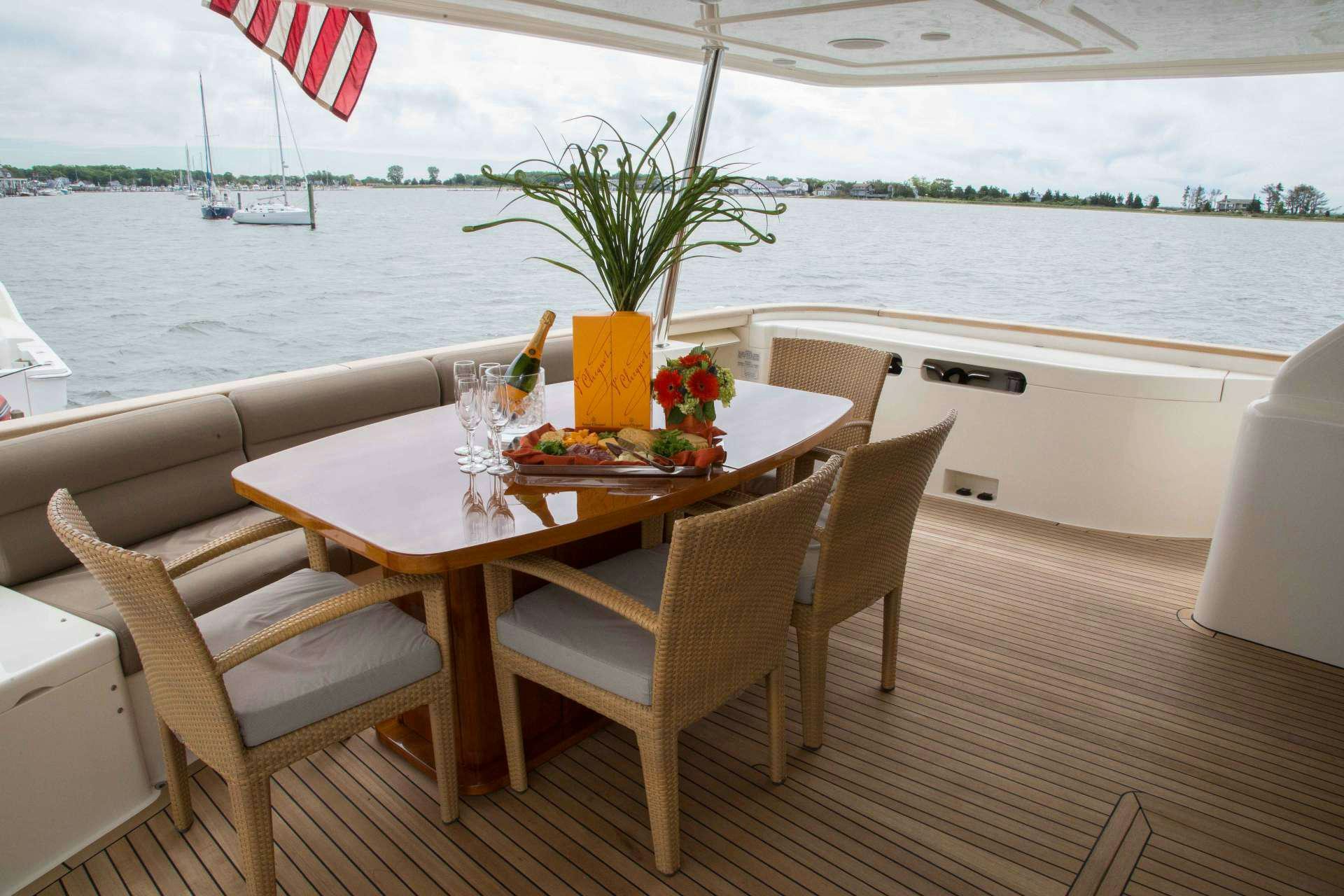 a table set for a meal on a boat aboard SLAINTE III Yacht for Charter