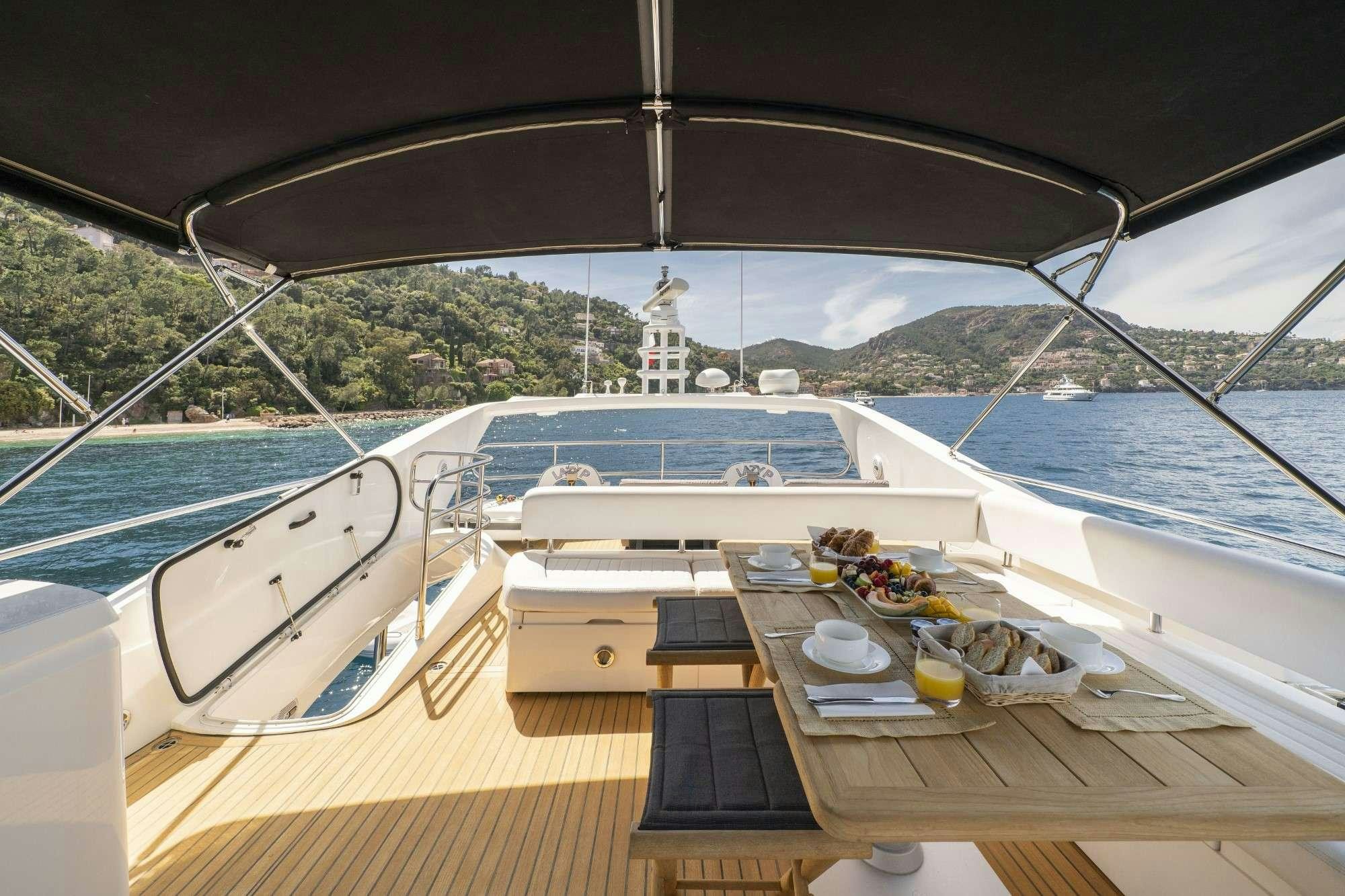 a boat on a deck aboard LAZY P Yacht for Charter