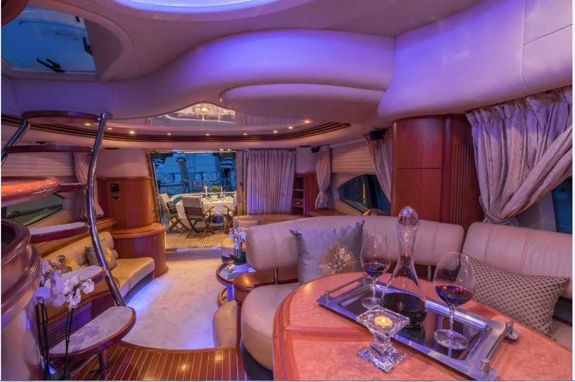 a living room with a large window aboard ALMAZ Yacht for Charter