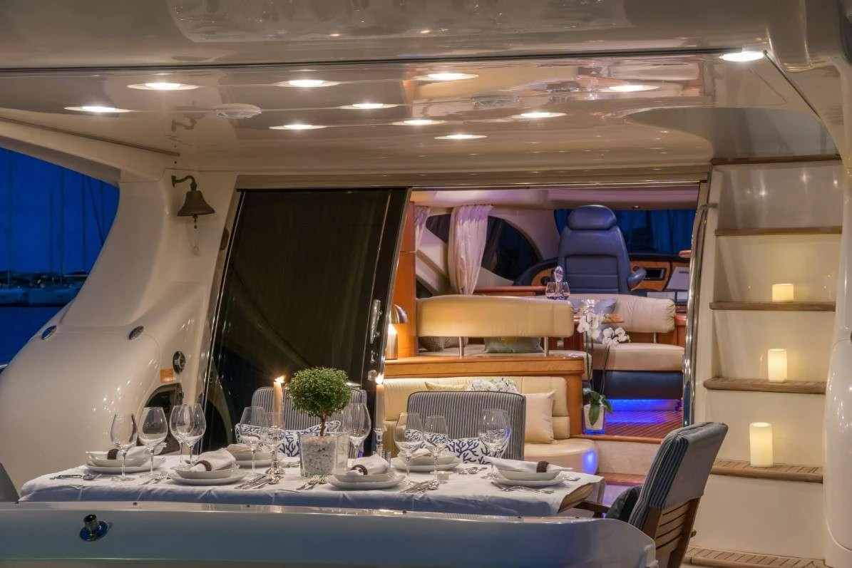a dining room with a table and chairs aboard ALMAZ Yacht for Charter