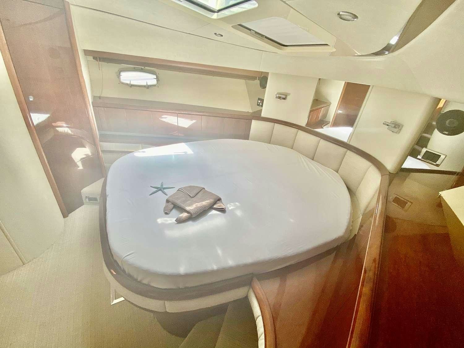 a white car in a room aboard VAGABUNDO Yacht for Charter