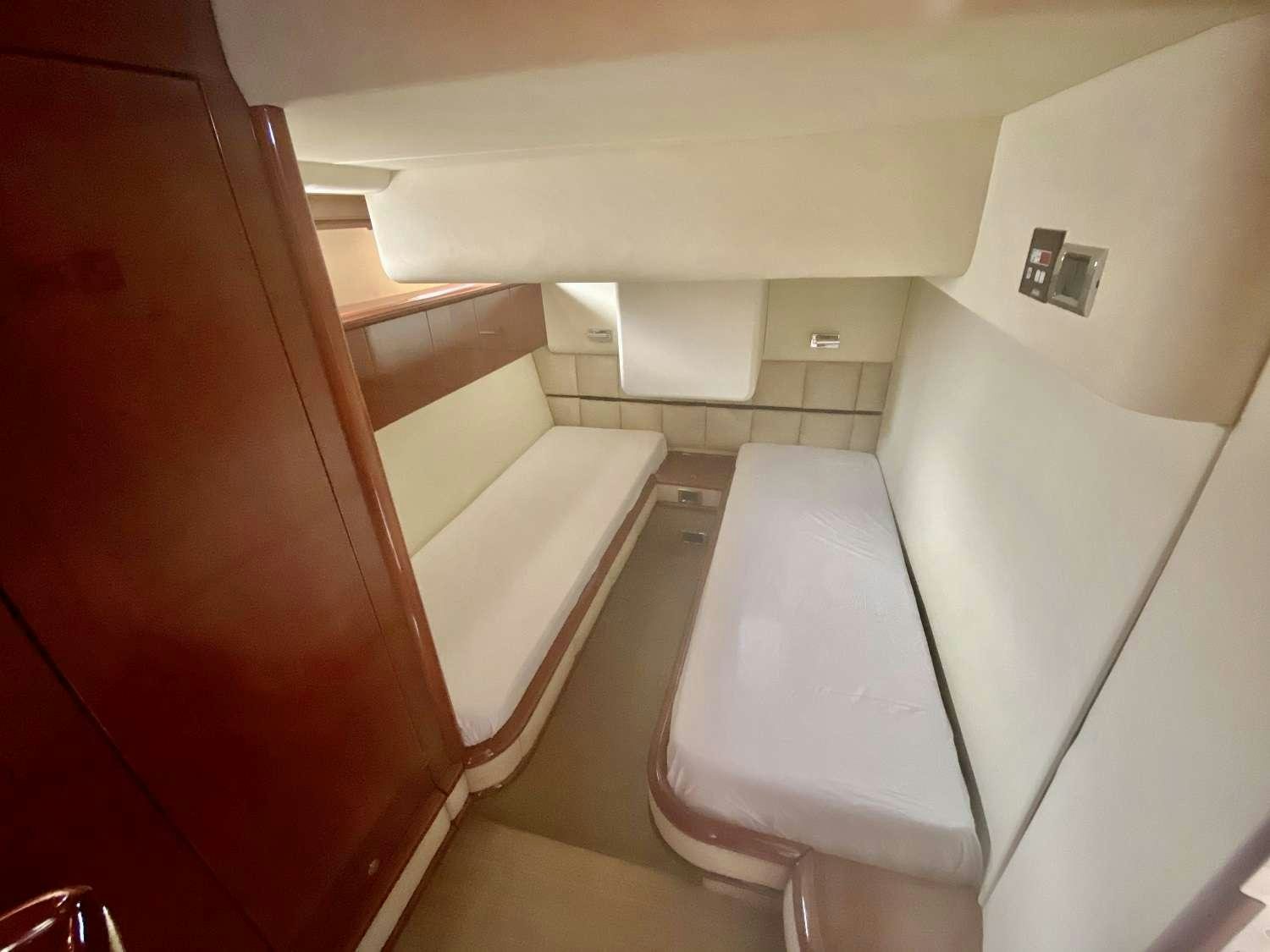 a bathroom with a toilet and a sink aboard VAGABUNDO Yacht for Charter