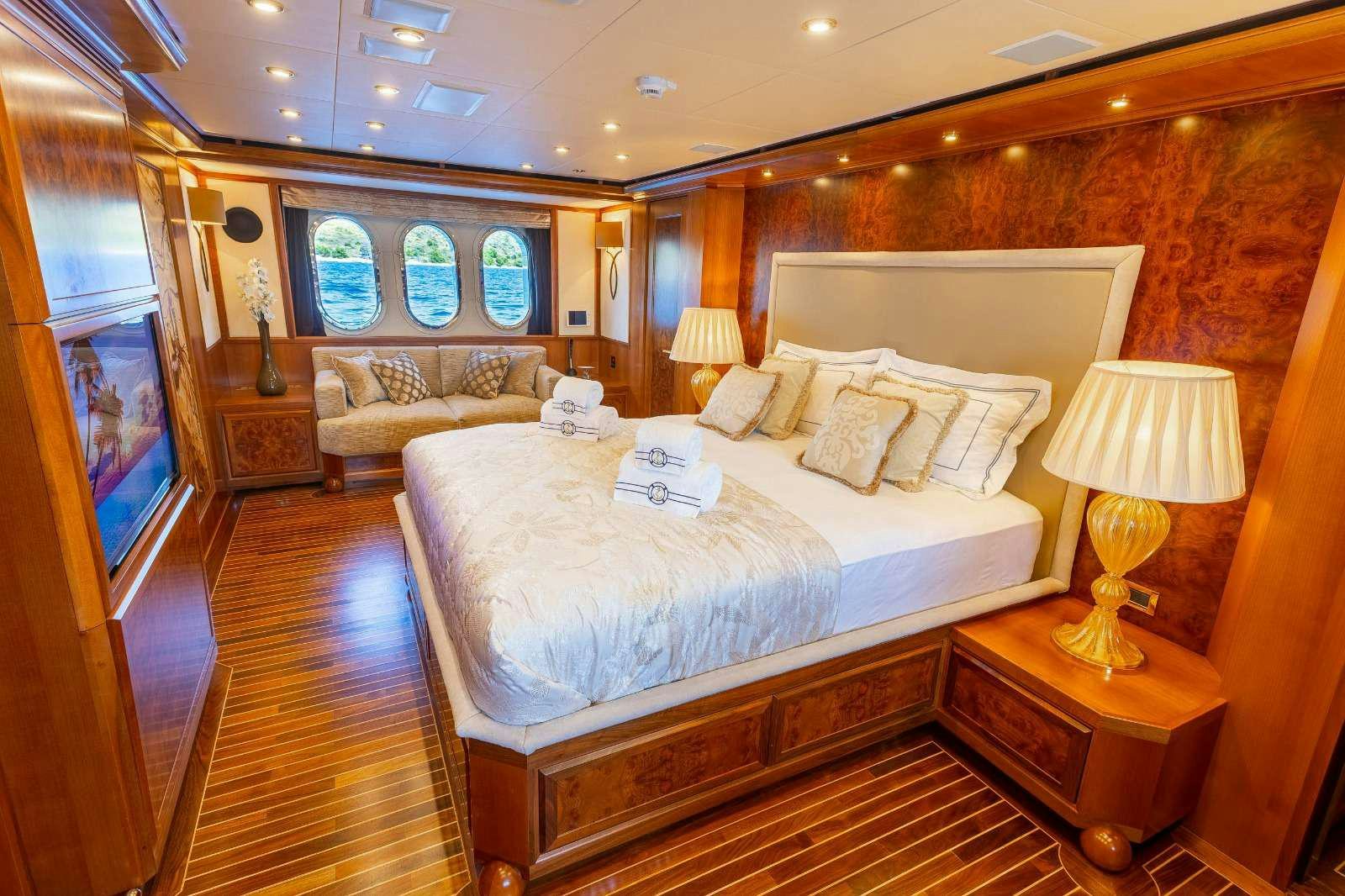 a large bedroom with a large bed aboard MILAYA Yacht for Charter