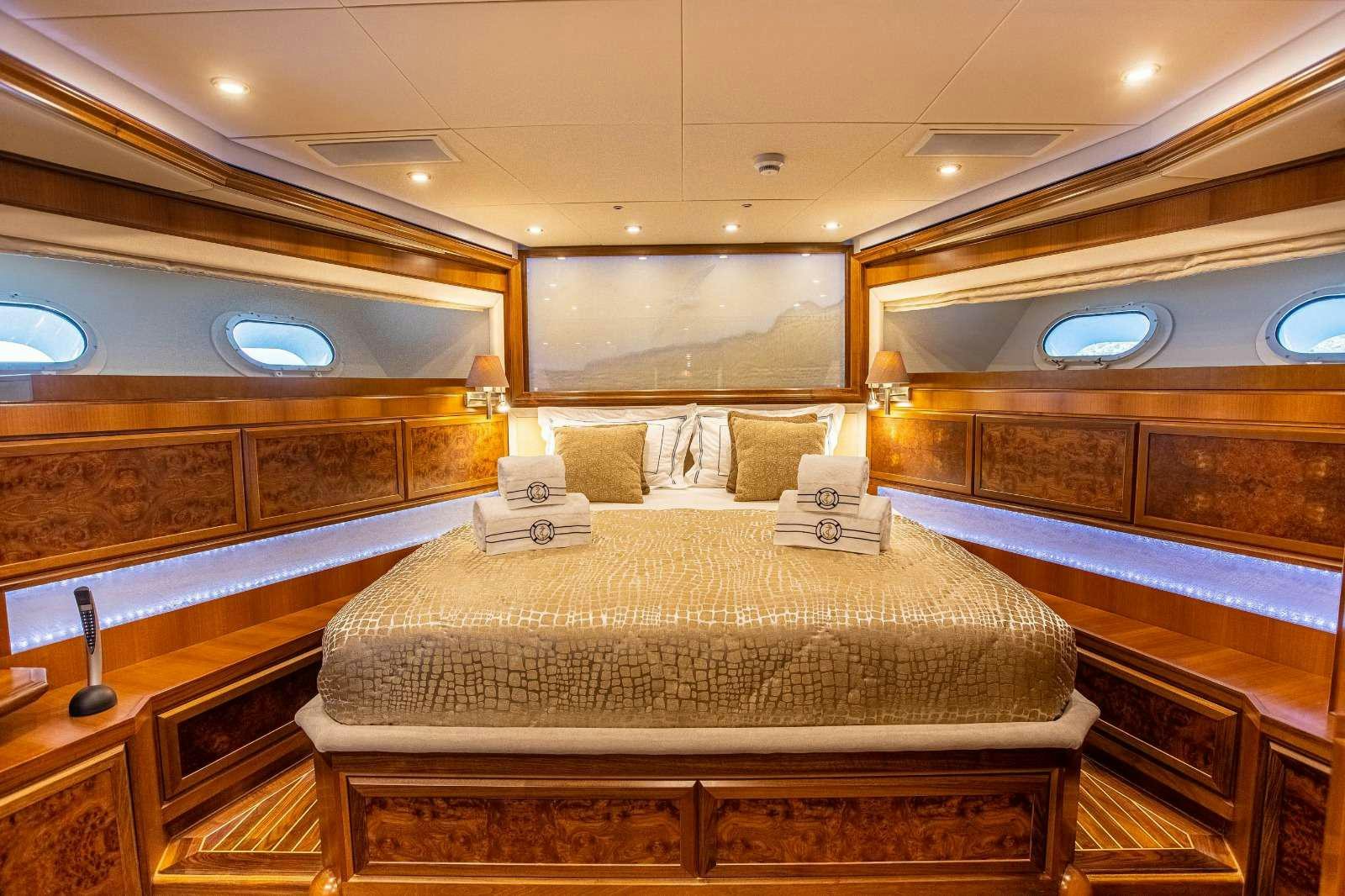 a large bedroom with a large bed aboard MILAYA Yacht for Charter
