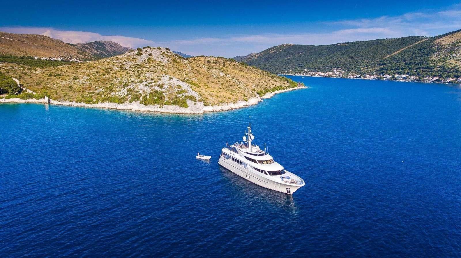 a boat sailing in the sea aboard MILAYA Yacht for Charter