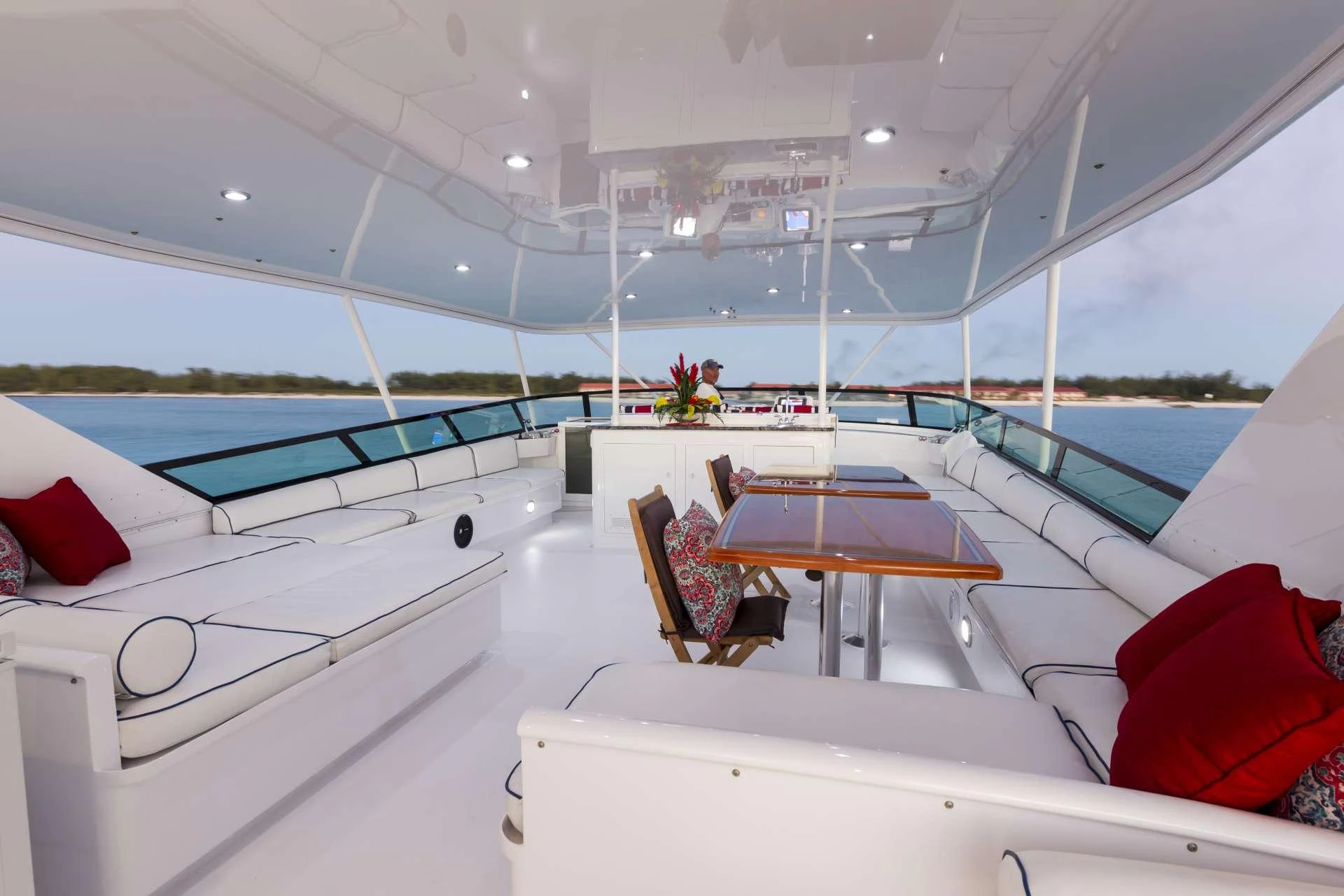 a boat with a table and chairs aboard IL CAPO Yacht for Charter
