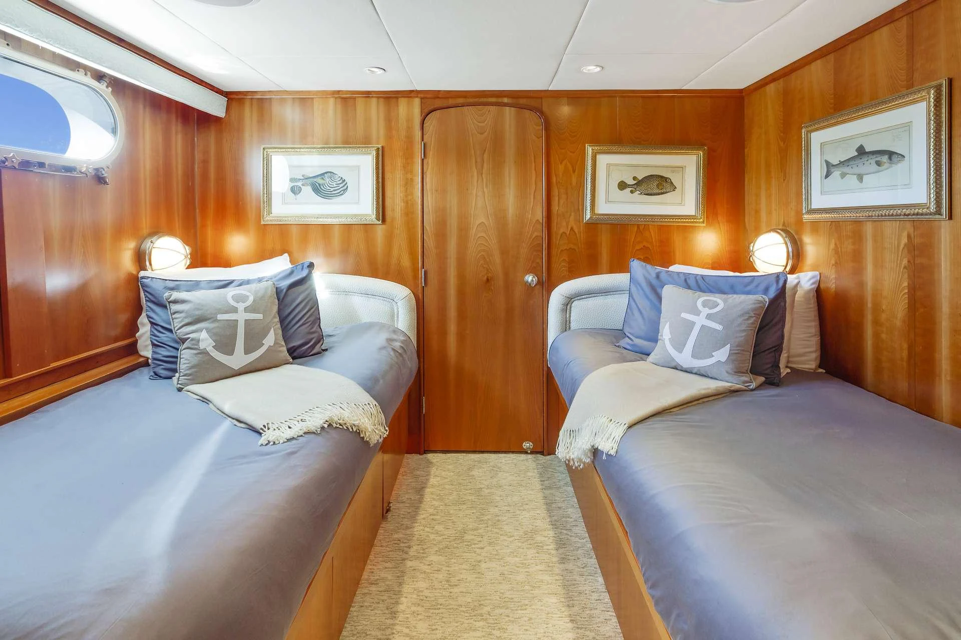 a room with two beds aboard IL CAPO Yacht for Charter