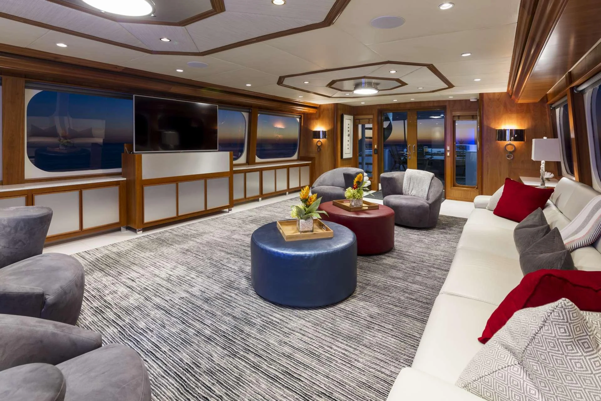 a large living room with a large tv aboard IL CAPO Yacht for Charter