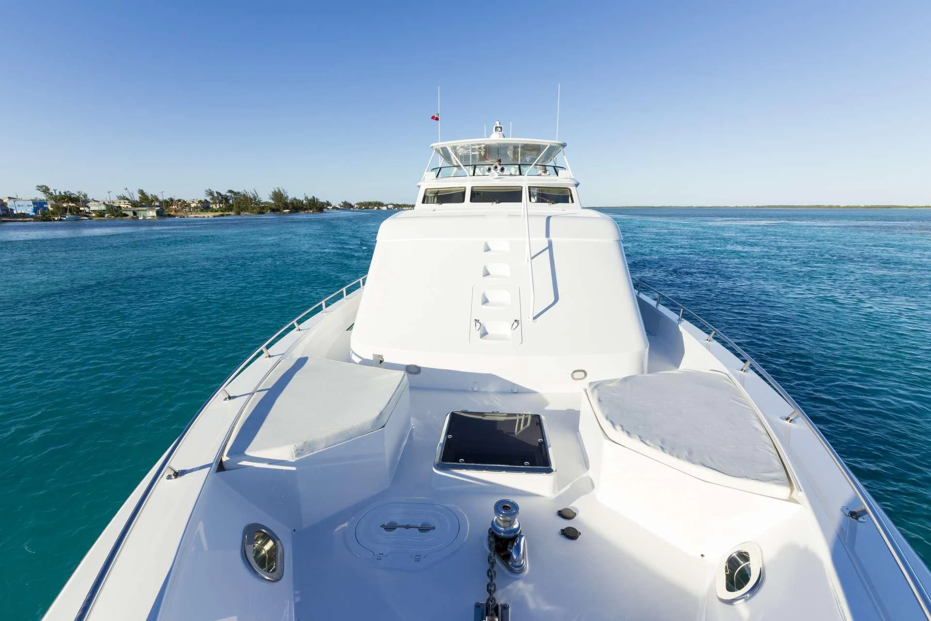 a white boat in the water aboard IL CAPO Yacht for Charter