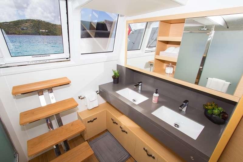 a bathroom with a large window aboard LE REVE L620 ESSENCE Yacht for Charter