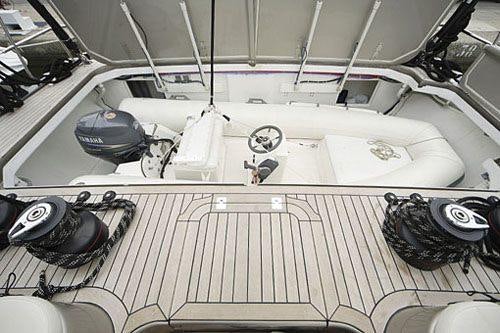 a car with a hood open aboard WIZARD Yacht for Charter