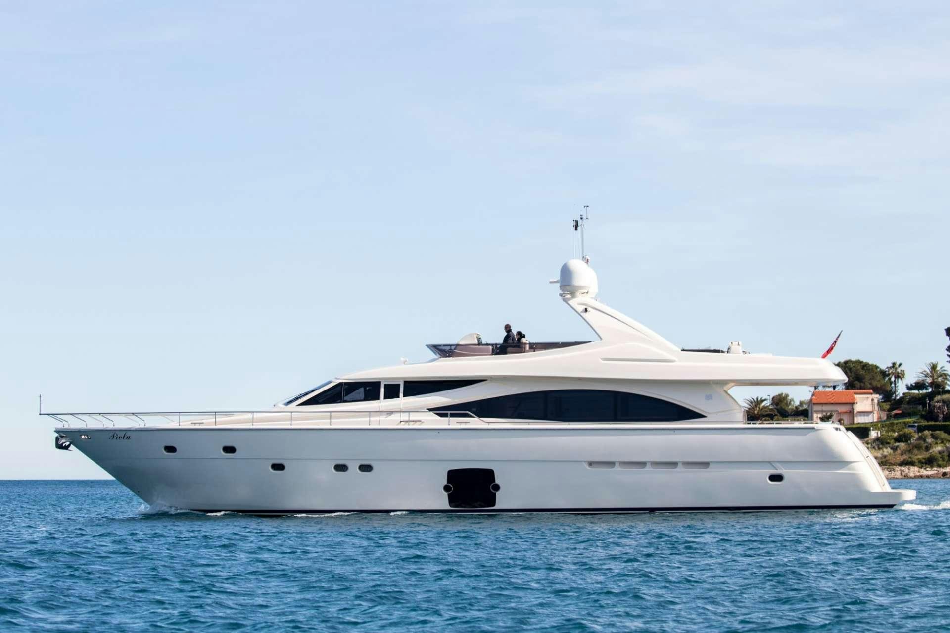 a white yacht in the water aboard PIOLA Yacht for Charter