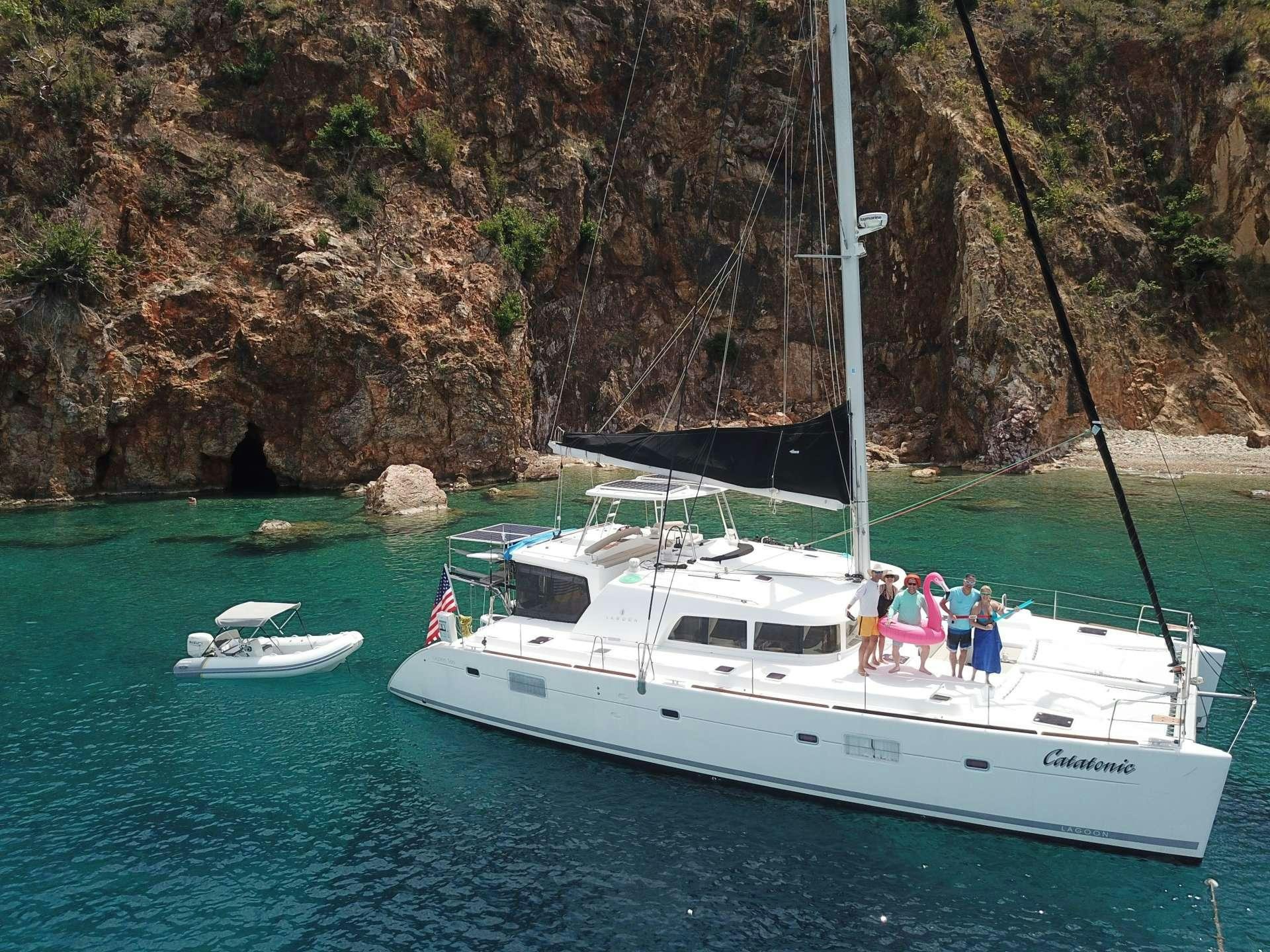 a group of people on a boat aboard CATATONIC 500 Yacht for Charter