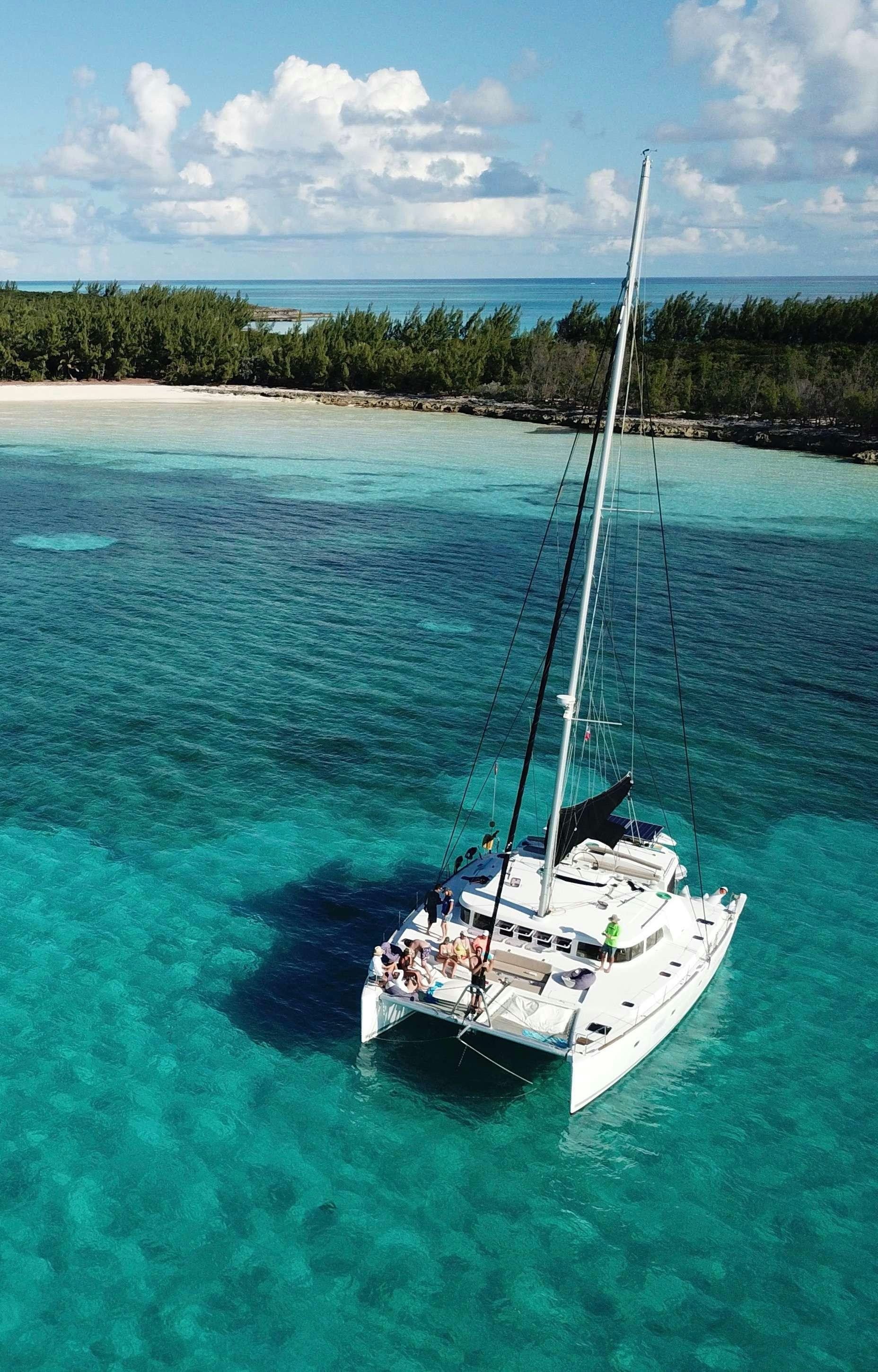 a boat sailing on the water aboard CATATONIC 500 Yacht for Charter