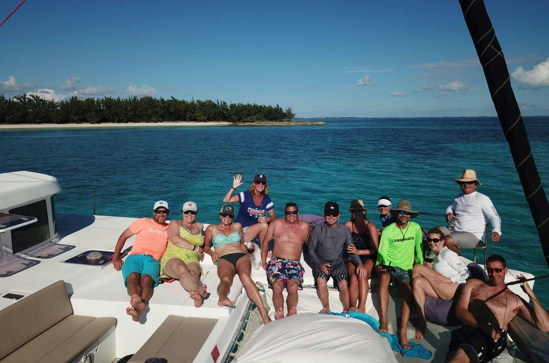 a group of people on a boat aboard CATATONIC 500 Yacht for Charter