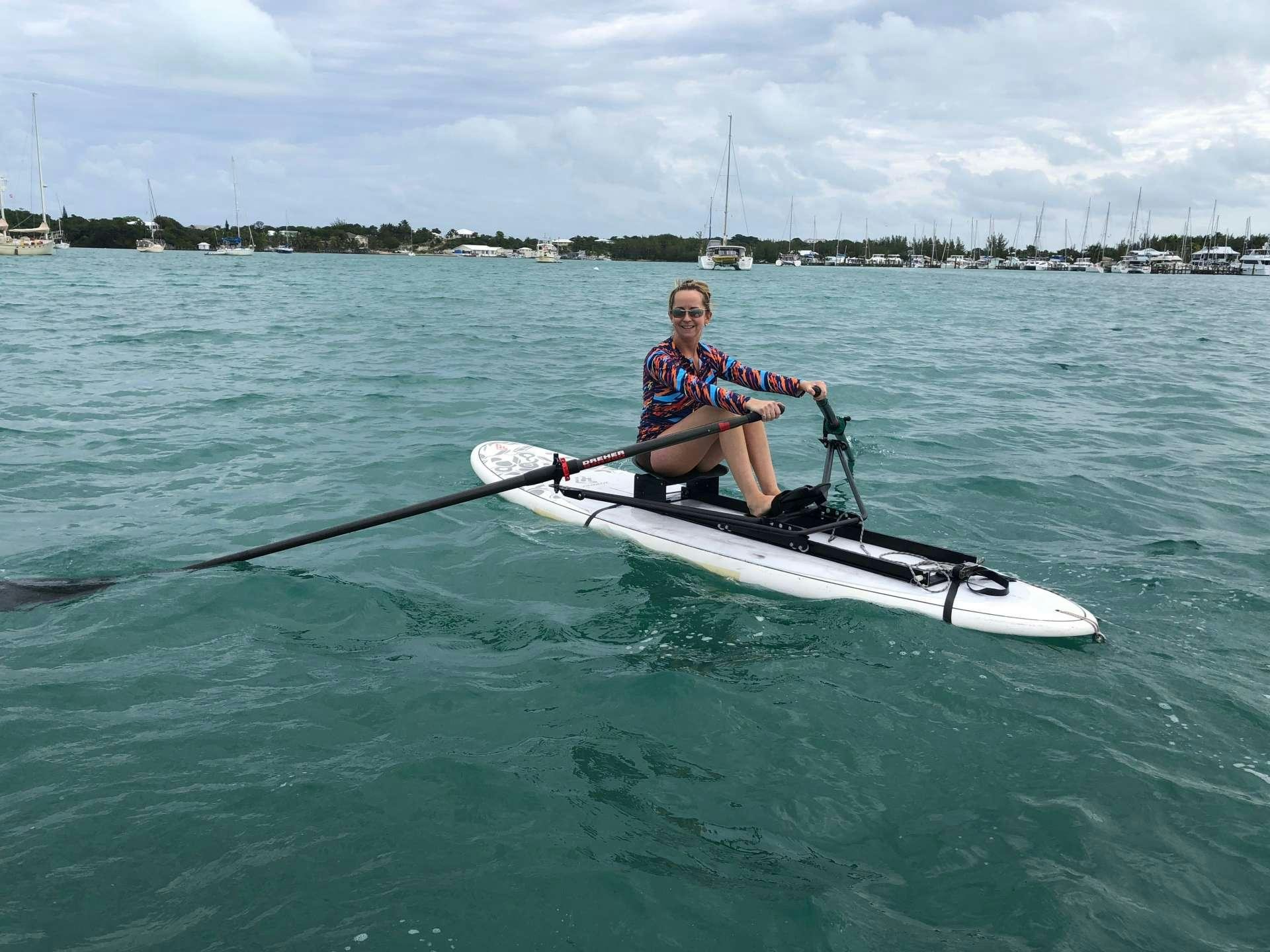 a man in a kayak aboard CATATONIC 500 Yacht for Charter