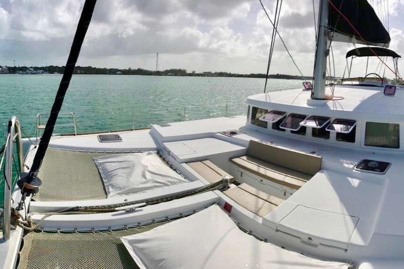 a couple of boats sit on a dock aboard CATATONIC 500 Yacht for Charter