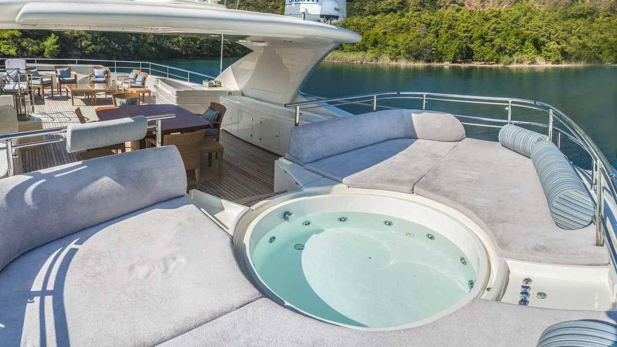 a pool with a person standing on the edge of it aboard ARIELA Yacht for Charter