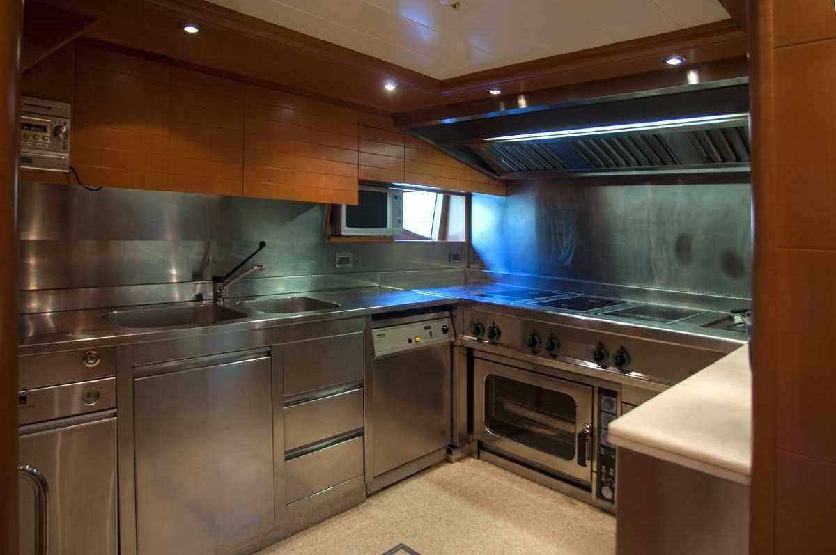 a kitchen with stainless steel appliances aboard ARIELA Yacht for Charter