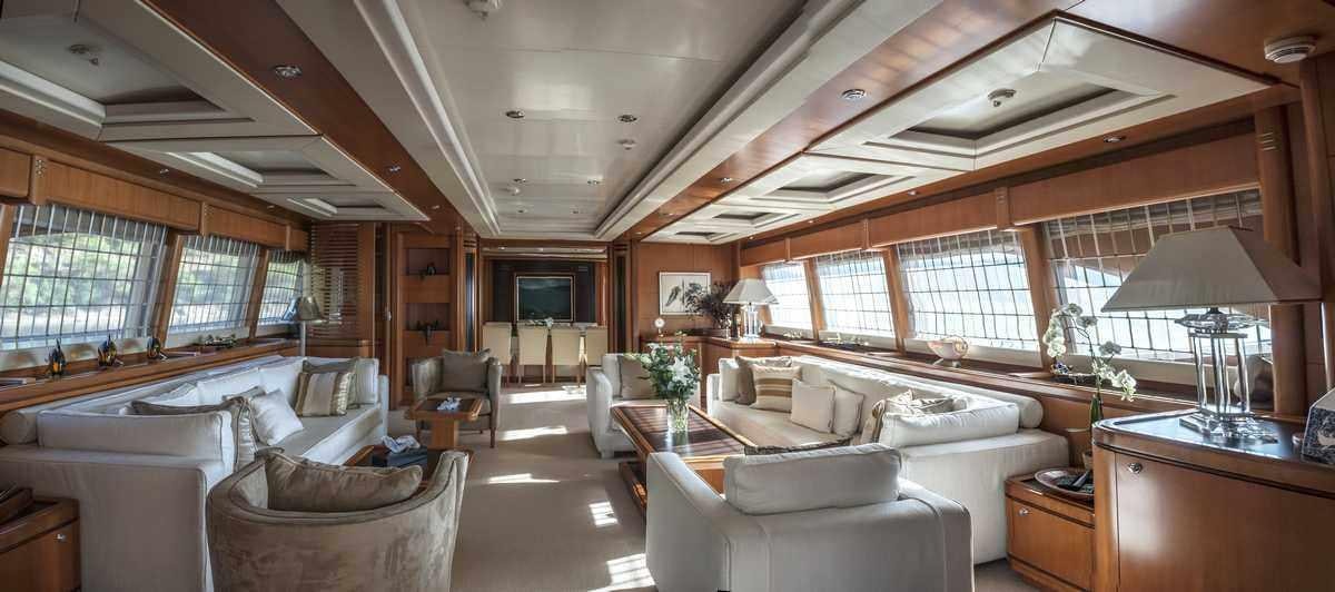a living room with a large window aboard ARIELA Yacht for Charter