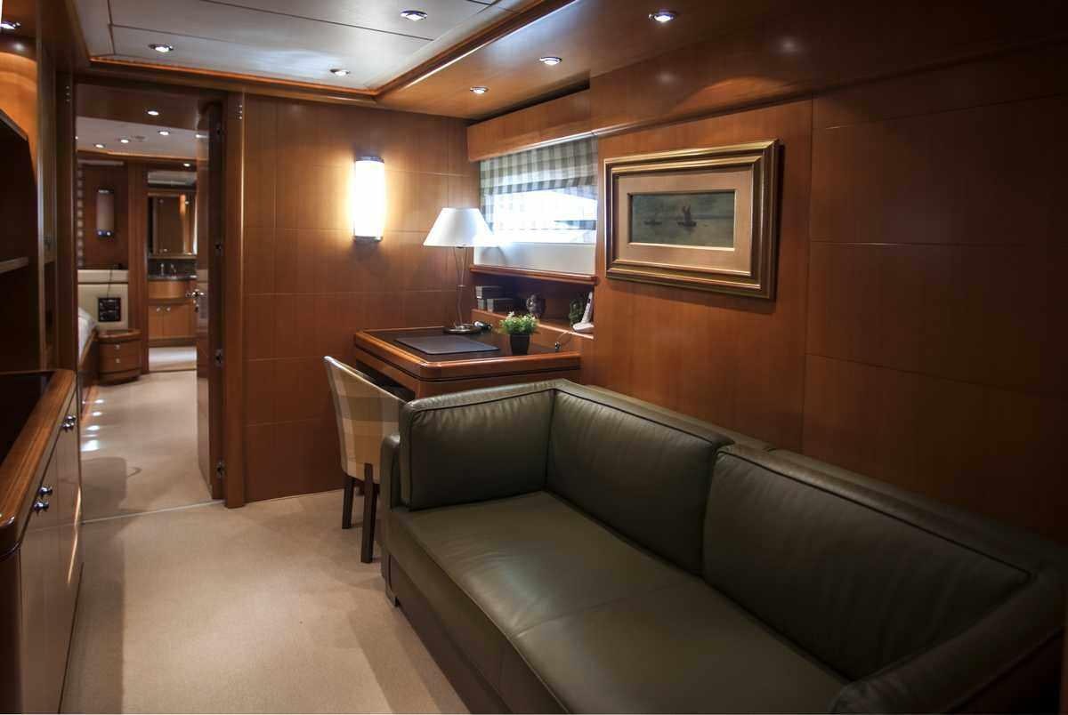 a living room with a couch aboard ARIELA Yacht for Charter