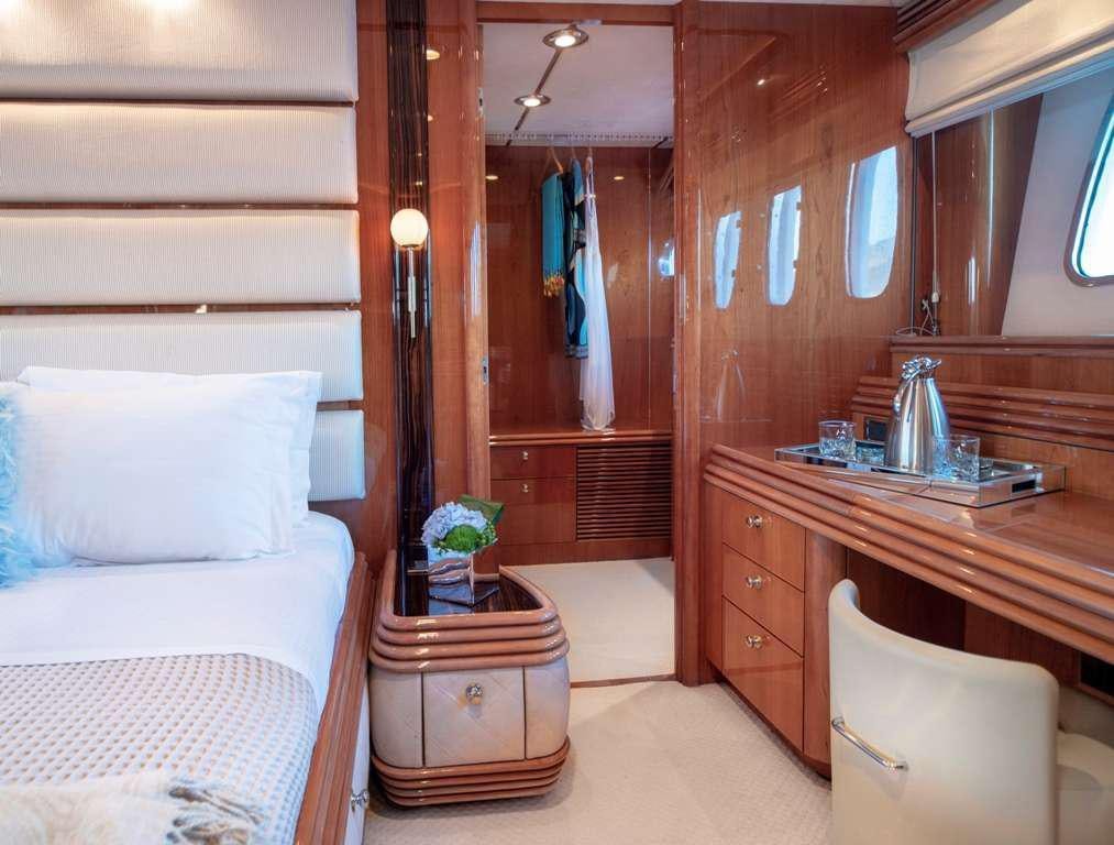 a room with a bed and a sink aboard MI ALMA Yacht for Charter