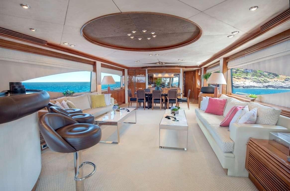 a living room with a large open window aboard MI ALMA Yacht for Charter
