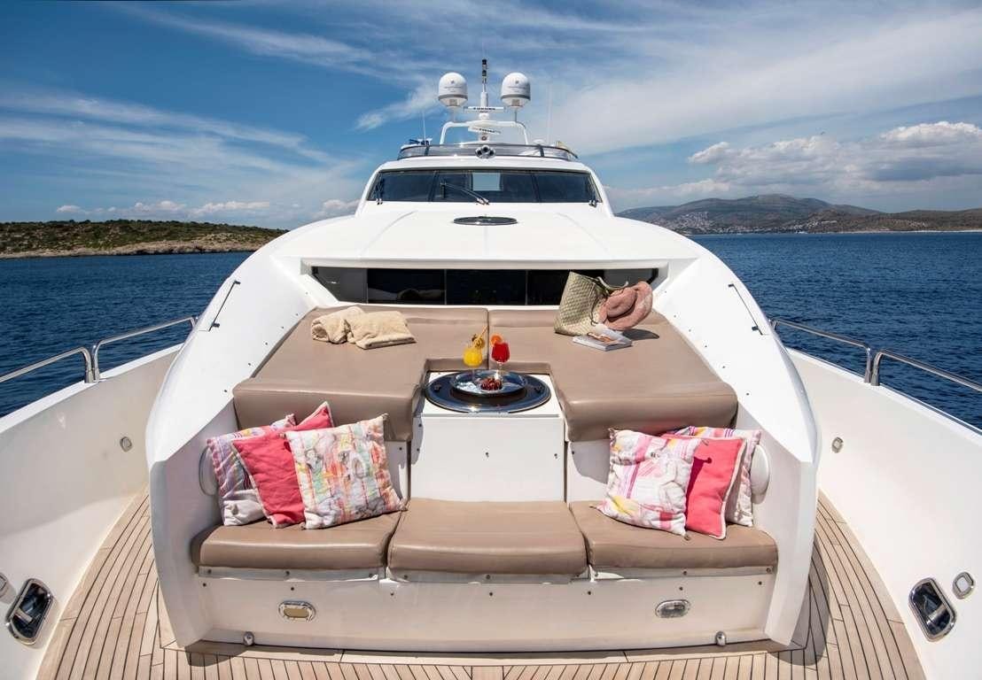 a person lying on a boat aboard MI ALMA Yacht for Charter