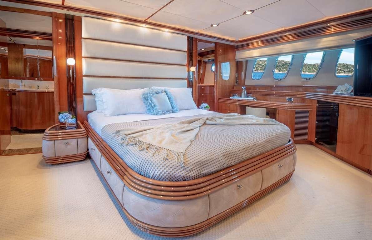 a bed in a room aboard MI ALMA Yacht for Charter