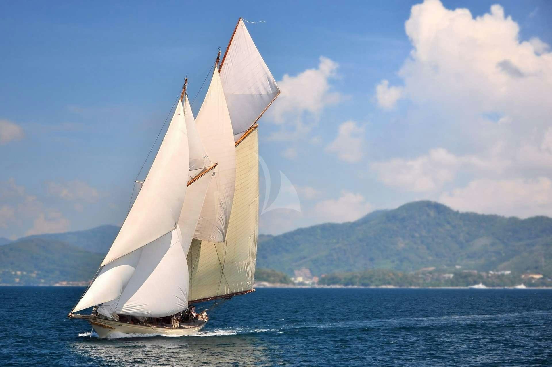 a sailboat on the water aboard Sunshine Yacht for Charter