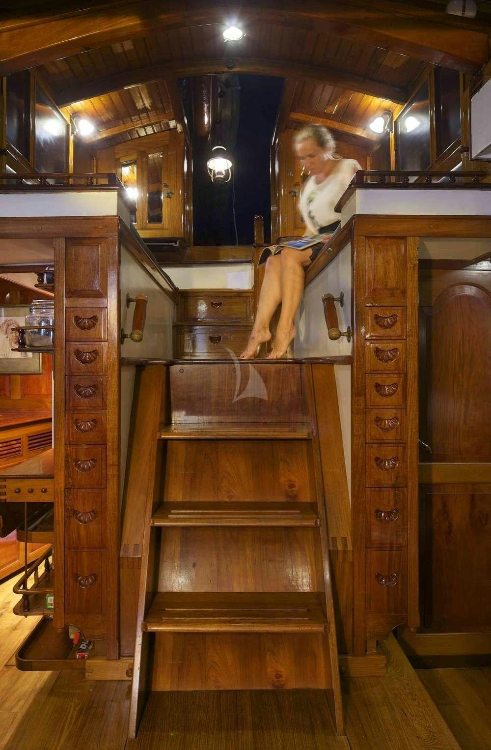 a statue of a person on a cabinet aboard Sunshine Yacht for Charter