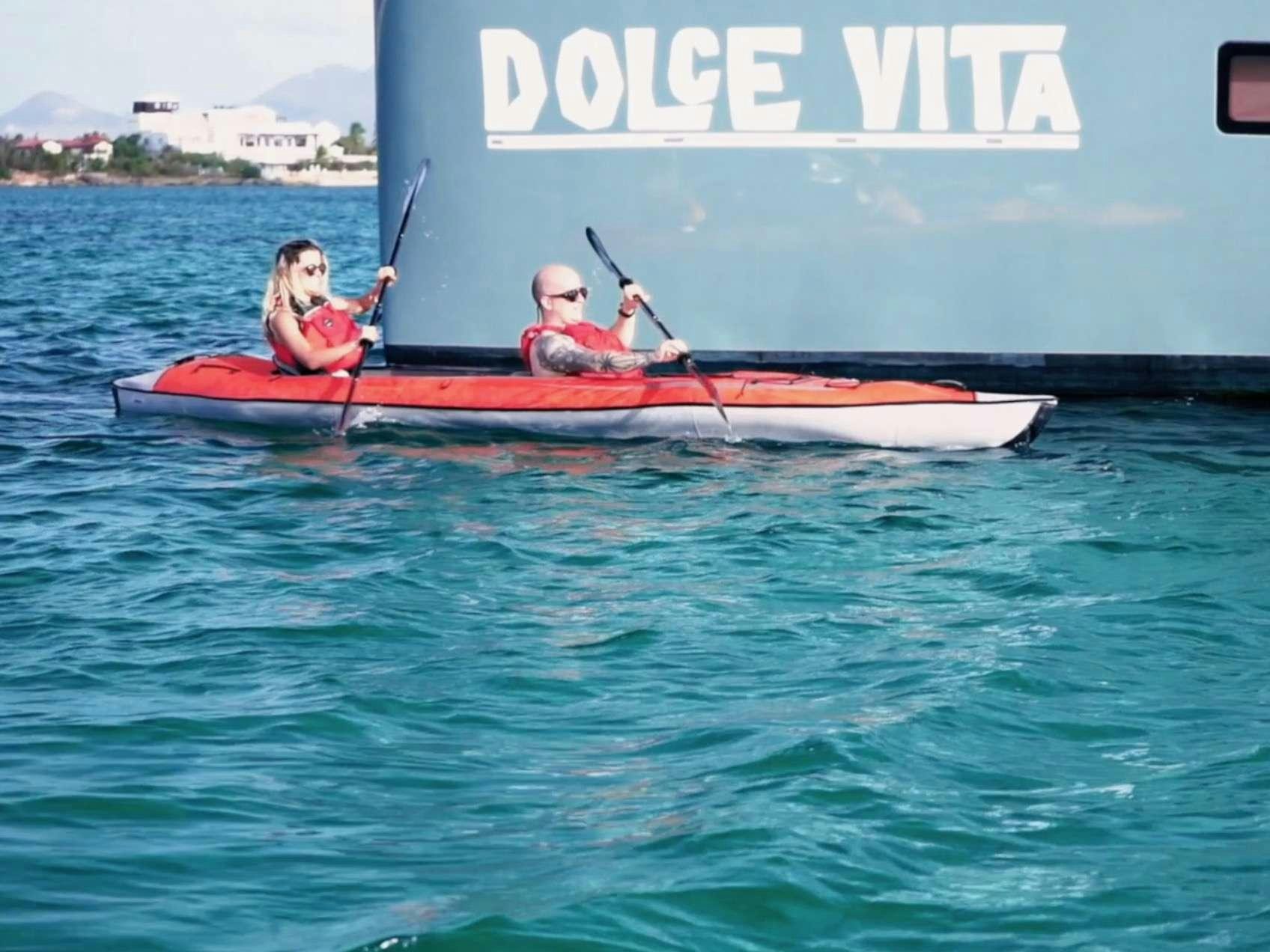 a group of people in a boat aboard DOLCEVITACAT Yacht for Charter