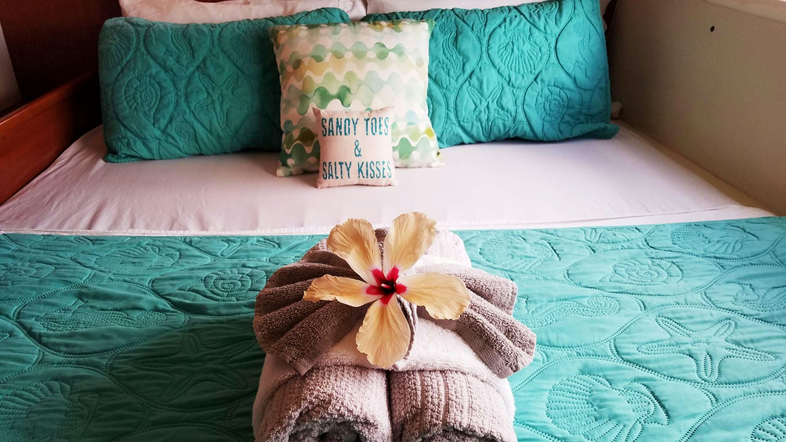 a flower on a bed aboard Flojo Yacht for Charter