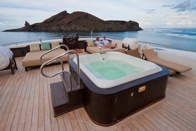 a boat on a dock aboard GALAPAGOS SEA STAR JOURNEY Yacht for Charter