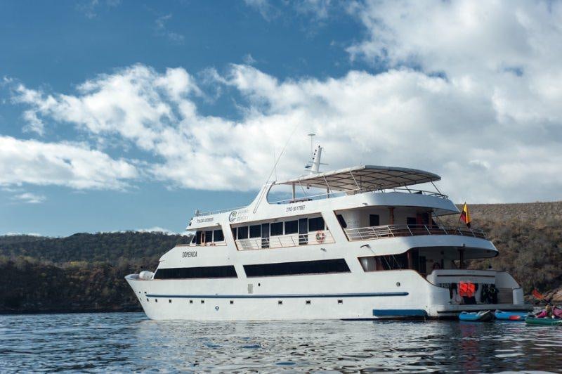a boat in the water aboard GALAPAGOS SEA STAR JOURNEY Yacht for Charter