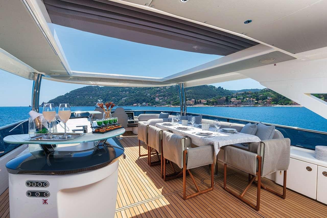 a table set for a meal aboard ENIGMA Yacht for Charter