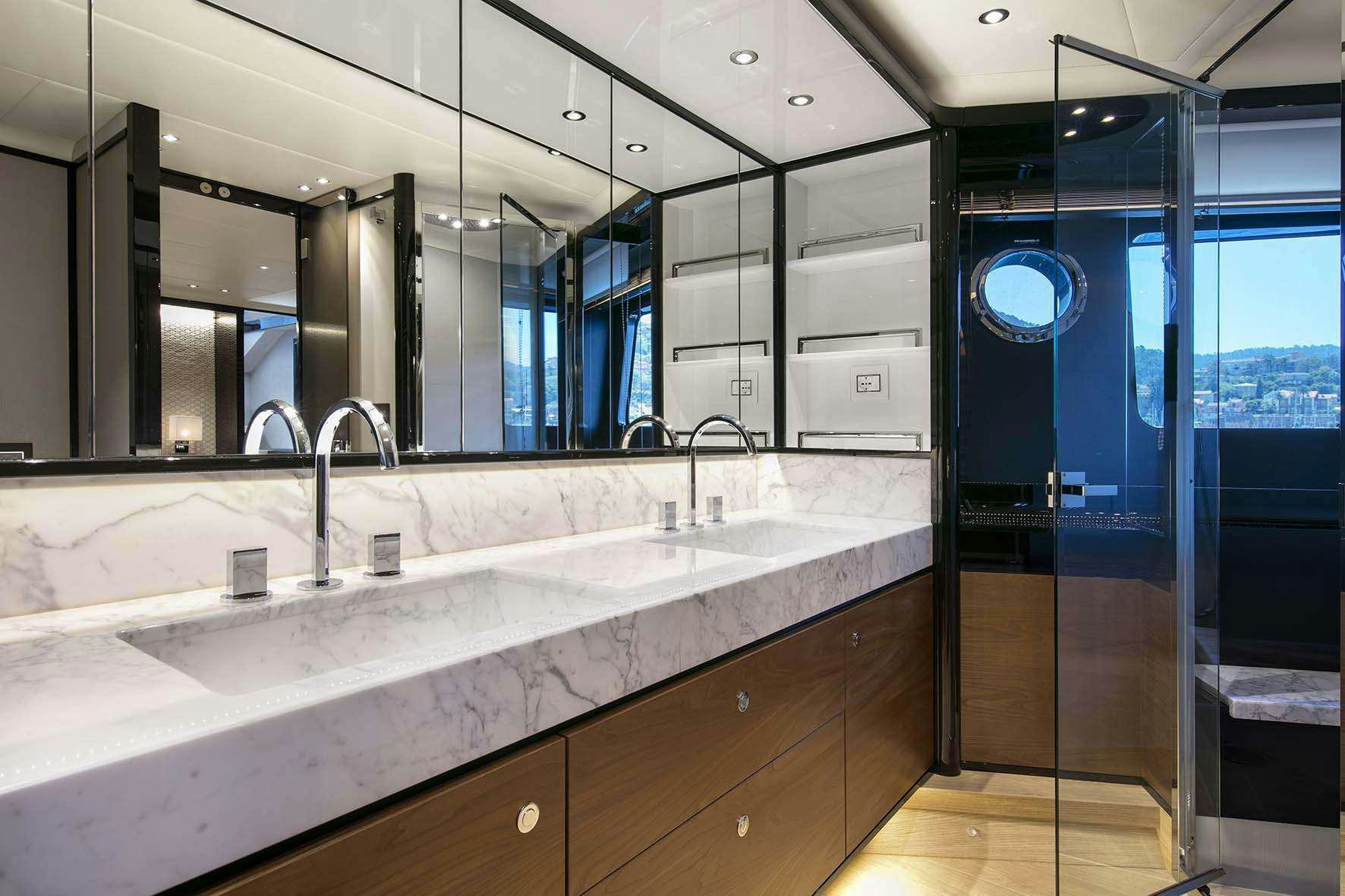 a bathroom with a countertop sink aboard ENIGMA Yacht for Charter