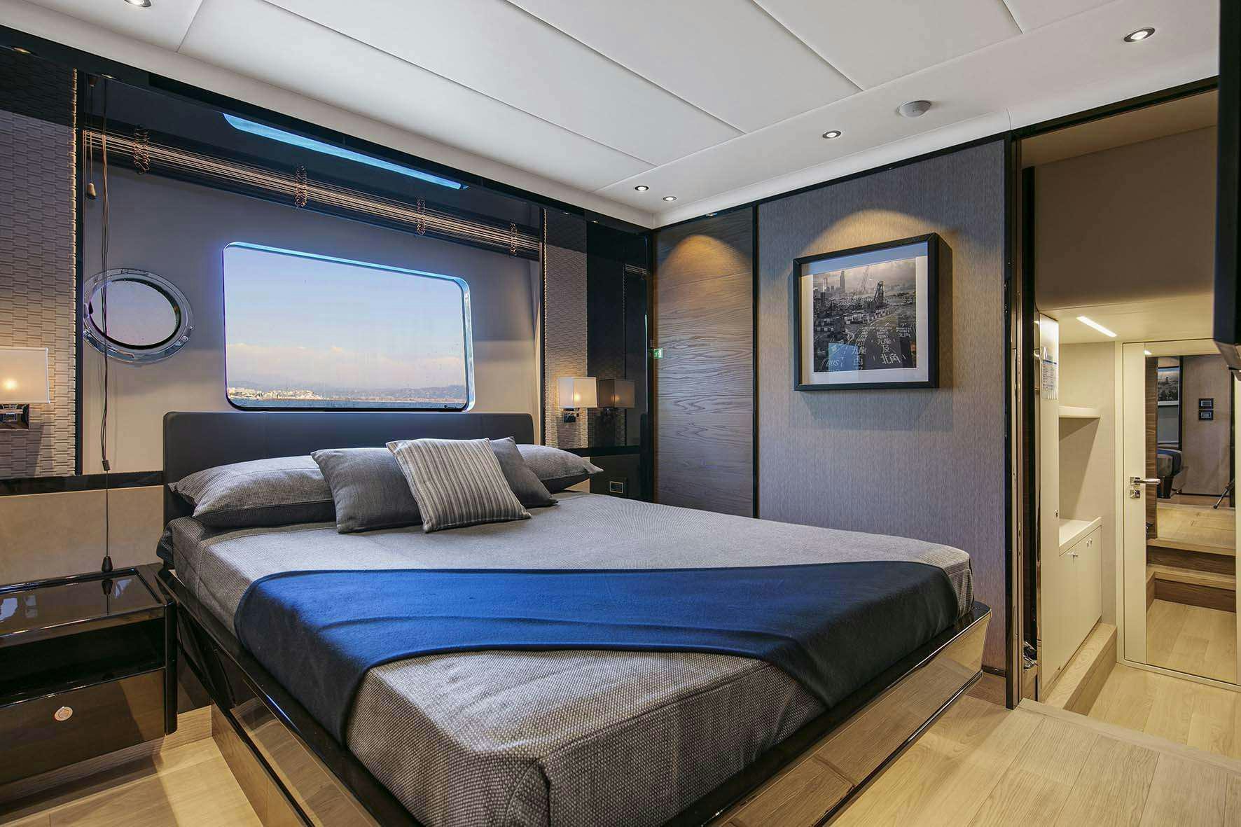 a bed in a room aboard ENIGMA Yacht for Charter