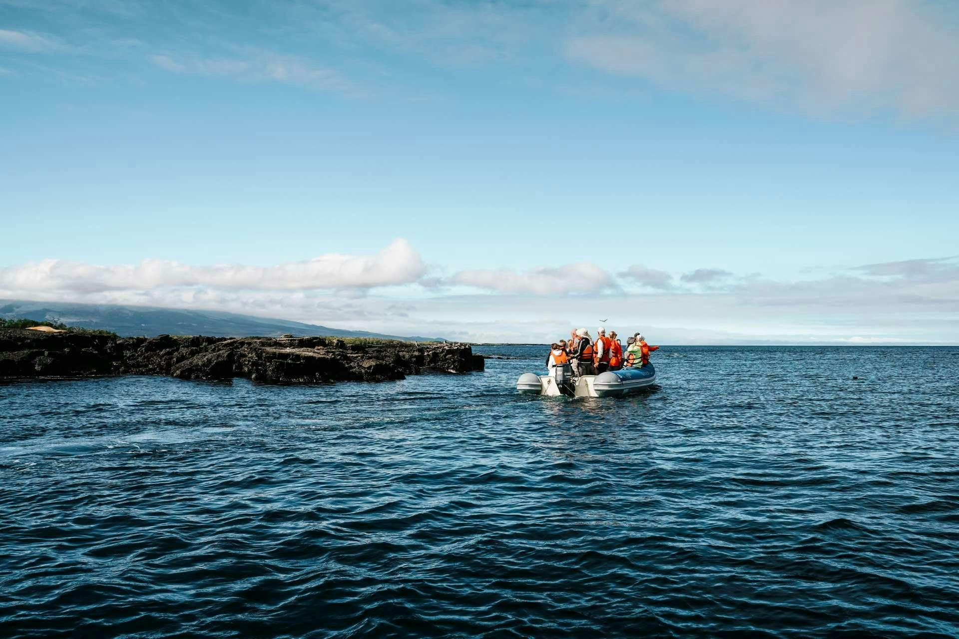 a group of people in a boat aboard INFINITY Yacht for Charter
