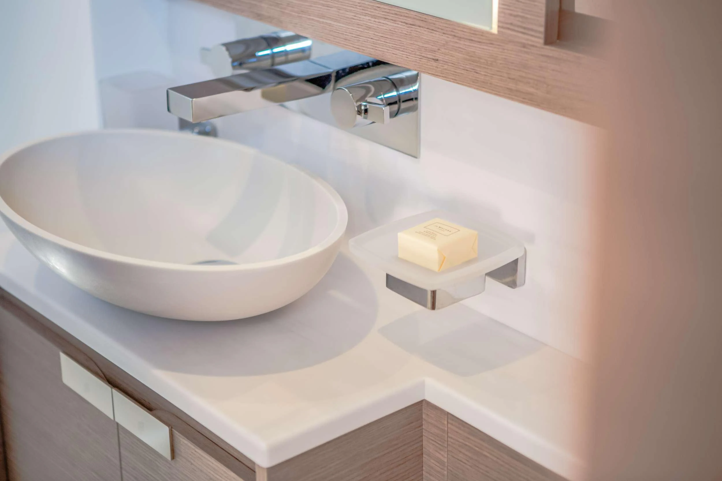 a white bathtub with a square sink aboard CHRISTAL MIO Yacht for Charter
