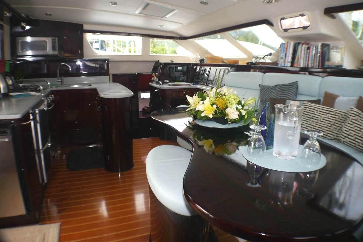 a restaurant with a table and chairs aboard NUTMEG Yacht for Charter