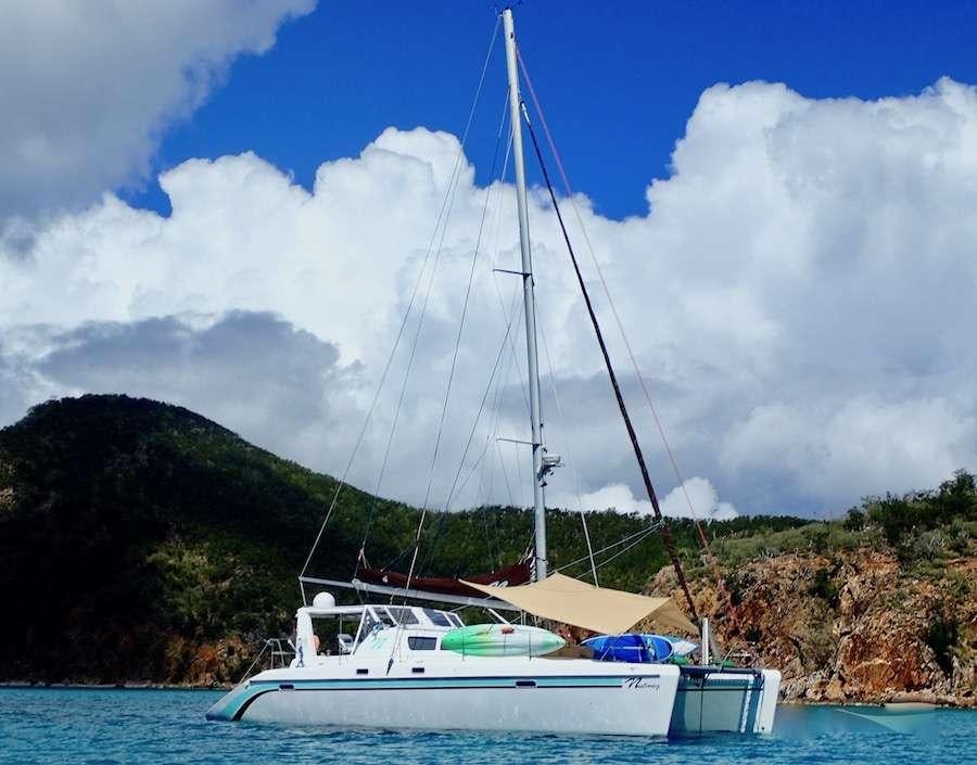 a sailboat on the water aboard NUTMEG Yacht for Charter