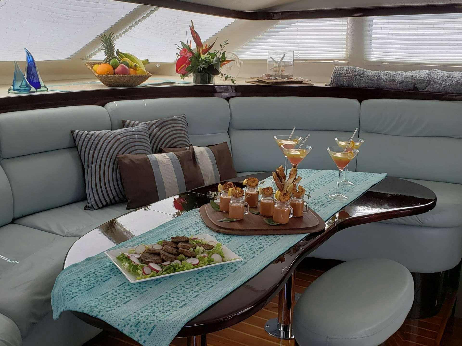 a table with food on it aboard NUTMEG Yacht for Charter