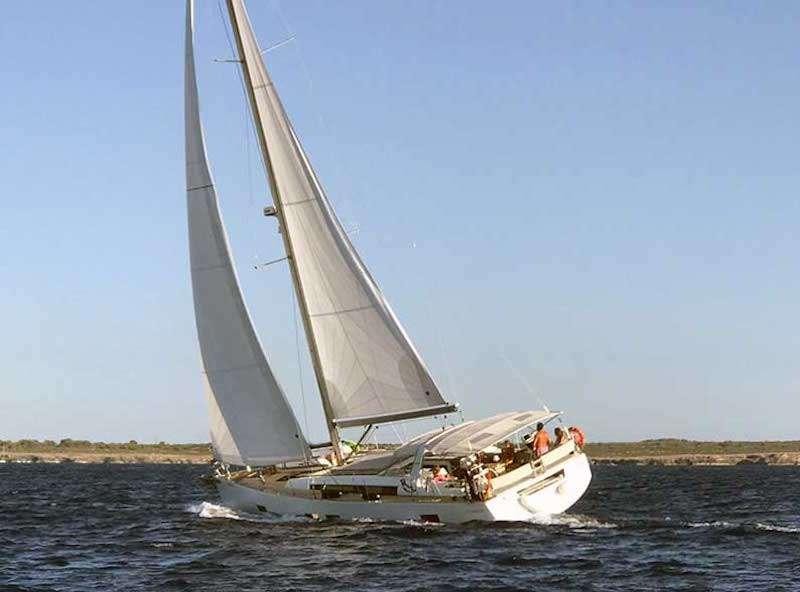 a sailboat on the water aboard SIRIUS Yacht for Charter