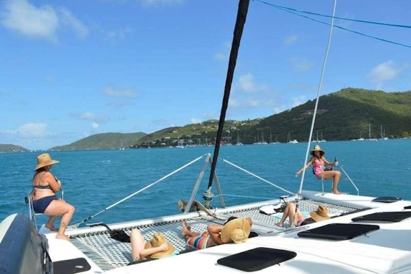 a group of people on a boat aboard FEEL THE MAGIC Yacht for Charter