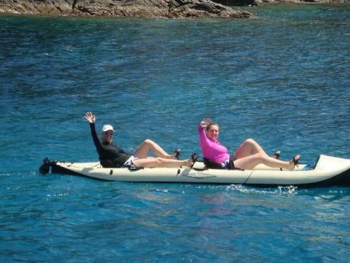 a couple of people on a boat aboard FEEL THE MAGIC Yacht for Charter