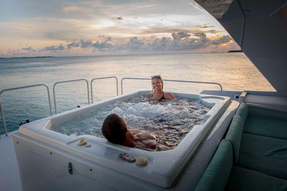 a couple of women in a boat aboard UNLEASHED Yacht for Charter